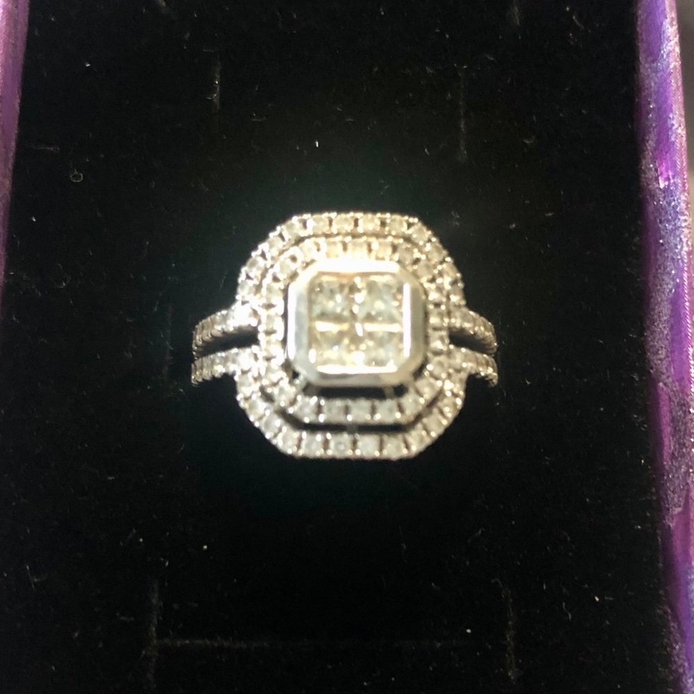 Ladies 14k white gold and diamond cluster ring.